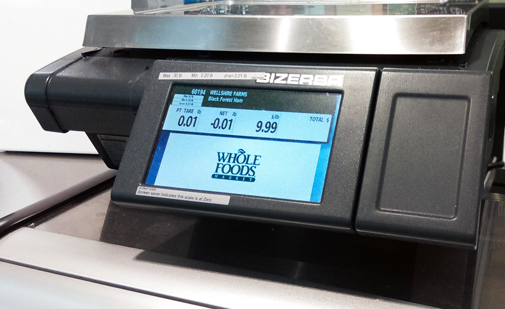 The digital scales at the supermarket, set to decimal ounces